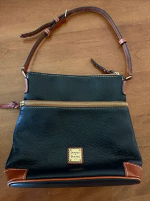 Vintage Dooney & Bourke “1975” Black Leather Shoulder Bag with Brown Trim thumbnail 1