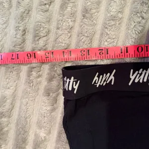 Yitty by Lizzo Black High Neck Wrap Front Mesh Back Logo Band Sports Bra thumbnail 3