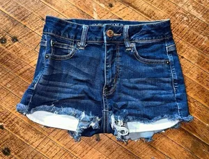 American Eagle distressed hi-rise 0 raw hem denim shorts thumbnail 1