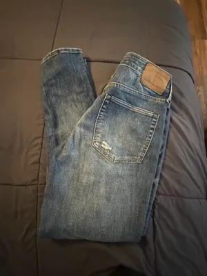 American Eagle Outfitters blue jeans with ripped details #distressed #denim thumbnail 2