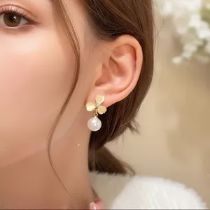 Gold Floral Pearl Drop Earrings thumbnail 1