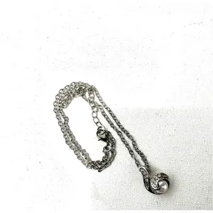 Faux pearl rhinestone silver tone pendant necklace thumbnail 5