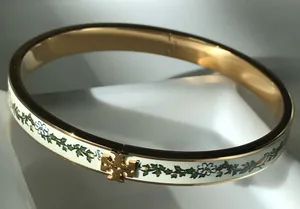 NWOT Tory Burch Gold and Cream Floral Bracelet thumbnail 1
