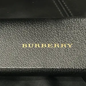 Burberry Black Case with Gold Logo includes Burberry cleaning cloth. thumbnail 4