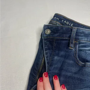 American Eagle Outfitters Super Hi-Rise Dark Wash Jegging (14) thumbnail 4