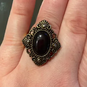Vintage style statement ring. Diamond shaped with black oval center. Adjustable thumbnail 3