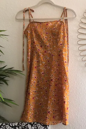 Floral mini dress with adjustable lace up tie knot straps with shirred back detail and invisible side zipper thumbnail 2