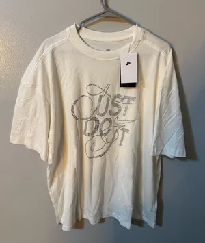 Nike White Short-Sleeve ‘Just Do It’ Graphic Tee thumbnail 1
