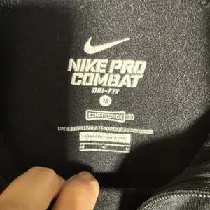Nike Pro Combat 1/4 Zip Pullover Women's Medium Black "Live Strong" thumbnail 3