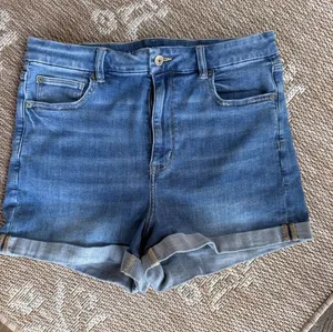 American Eagle Outfitters Medium Blue Denim Cuffed Shorts thumbnail 1