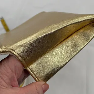 Shimmering Vintage faux leather gold clutch. thumbnail 8