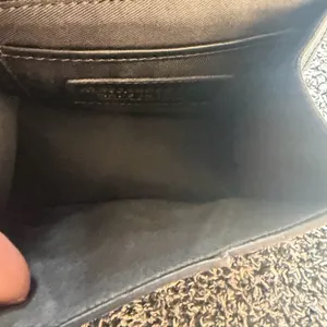 Elegant Black Leather Bag with Gold Accents thumbnail 15