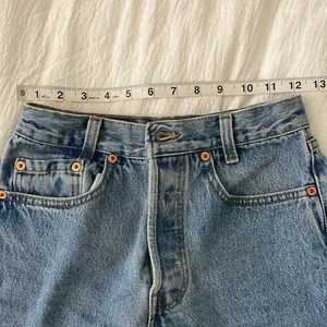 Levi's Blue Jean Shorts with Frayed Hem and Distressed Look Vintage thumbnail 5