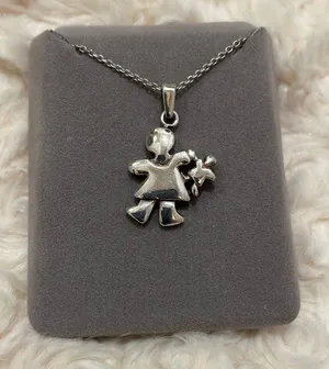 Silver child  with doll charm pendant thumbnail 1