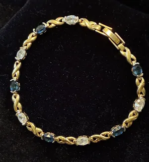 Vtg Gold-Tone Faux Sapphire & CZ Tennis Bracelet – Hugs & Kisses "X" Link 7.5” thumbnail 1