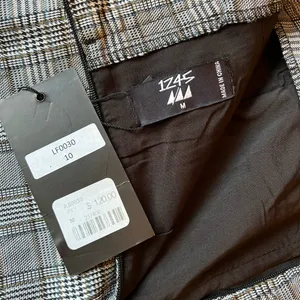 NWT LF plaid zip side shorts thumbnail 3