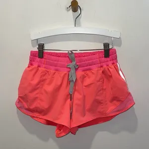Lululemon Womens Drawstring Flat Front Running Athletic Shorts Coral Pink Size 6 thumbnail 2