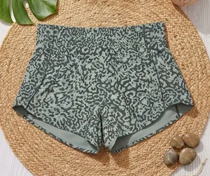 ATHLETA Sage Green Leopard Print Running Shorts | Dolphin Hem Lined thumbnail 1