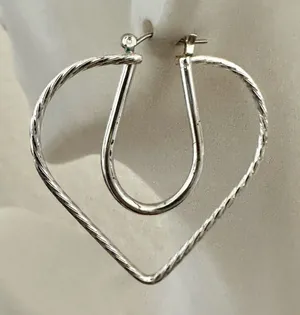 Silver tone cut out heart earrings thumbnail 1