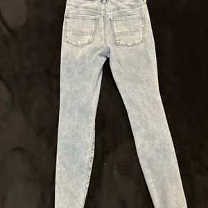 American Eagle 🦅 360 Next level stretch distressed hem skinny thumbnail 7