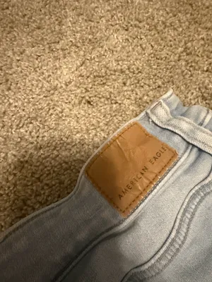 American eagle light wash next level stretch mid rise jean shorts size 12 thumbnail 3