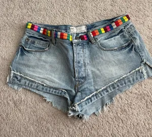 Free People Light Blue Denim Cutoff Shorts with Multicolor Woven Belt size 27 thumbnail 1