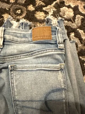 American Eagle Next Level Stretch Super Distressed Jeans size 0 thumbnail 6