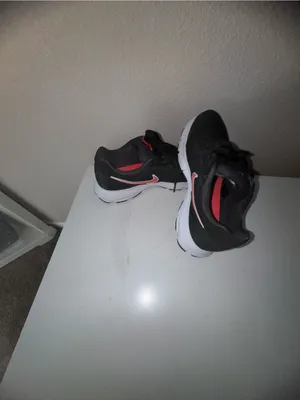 Nike Women's Black Sneakers with Red Swoosh thumbnail 11