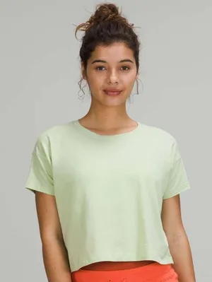 Lululemon Large Mint Green Cropped Short Sleeve Shirt Athleisure Women's size 10 thumbnail 1