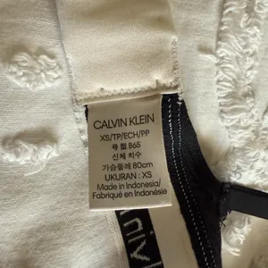 Calvin Klein Black and White Cross-Back Bra thumbnail 5