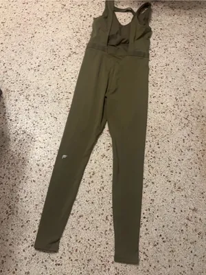 Fabletics Motion 365 onesie in olive green features a racerback design thumbnail 6