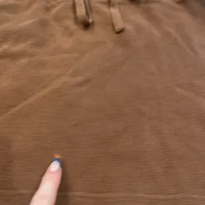 Brandy Melville Brown Skater Mini Skirt with Tie Front thumbnail 2