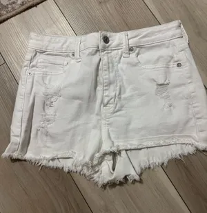 American Eagle Outfitters White Distressed Frayed Hem Denim Shorts thumbnail 1