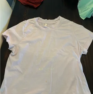 Super cute free people top it’s very worn. The pink is kind of washed out in the photo but not really in person. thumbnail 2