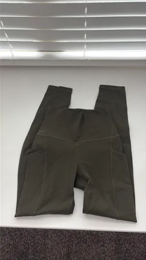 olive green lululemon leggings w/ pockets thumbnail 2