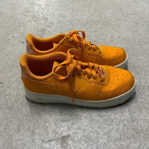 Orange Nike Air Force 1s Size 8 with Halo graphic Nike Symbol (7) thumbnail 4