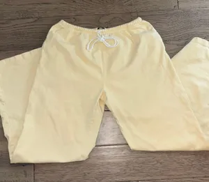 Brandy Melville, butter, yellow wide leg sweat sweatpants with no flaws thumbnail 1