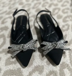 BCBGeneration Black Rhinestone Bow Slingback Flats thumbnail 1