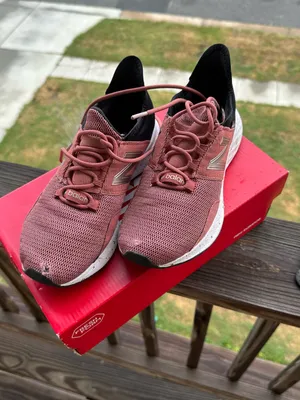 New Balance Women's Sneakers in Dusty Rose with Black Heel thumbnail 1