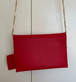 Red Clutch Bag With Bow And Gold Chain thumbnail 2