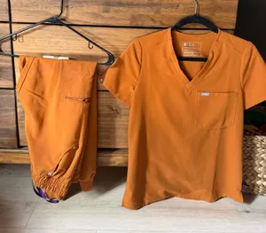 FIGS Burnt Orange Scrub High-Waisted Joggers + Top Set thumbnail 1