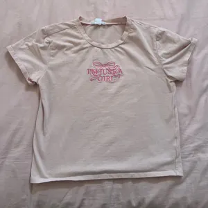 “I’m just a girl” pink bow baby tee thumbnail 1
