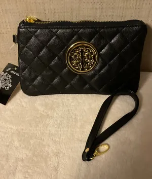 Black Quilted Wristlet Clutch with Gold Medallion thumbnail 1