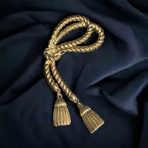 Vintage gold tone lasso rope brooch thumbnail 1