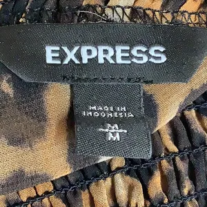 Express Size Medium Leopard Print Smocked Mock Neck Tie-Front Top. Preloved thumbnail 7