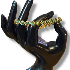 Gold tone emerald clovers tennis bracelet thumbnail 2