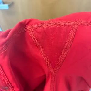 Lululemon Run Speed Squad Skirt Shorts Red Zipper pocket Sz 4. Preloved. thumbnail 6