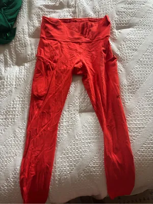 Athleta orange legging with side pockets size small barely worn thumbnail 1