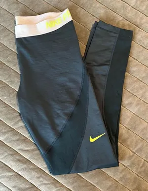NIKE Women’s Dark Green Leggings thumbnail 1