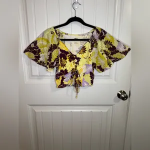 Anthropologie Maeve Purple and Yellow Floral Flutter Sleeve Cinched Top thumbnail 2